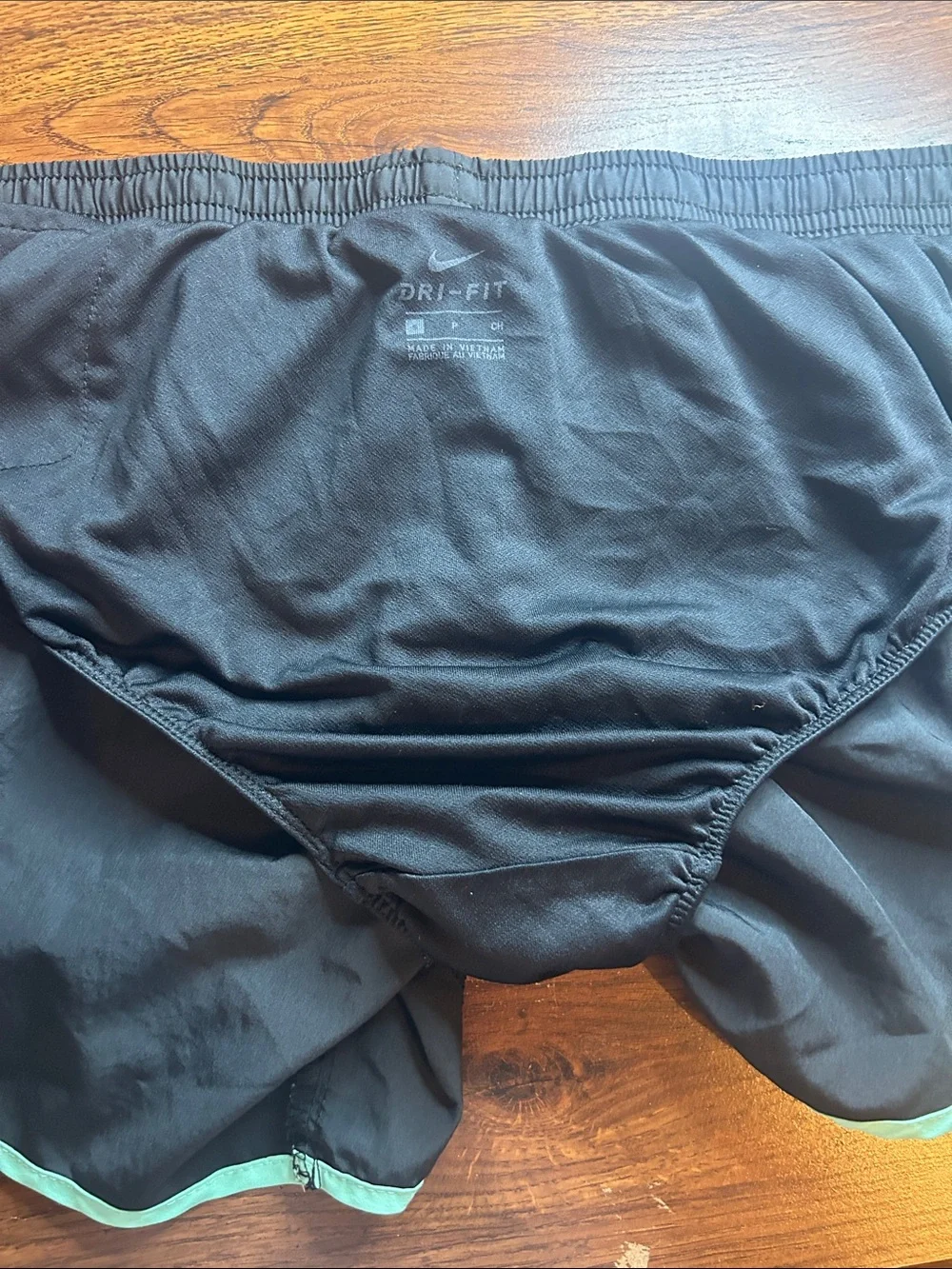 Nike Women's Black Athletic Shorts with Mint Trim